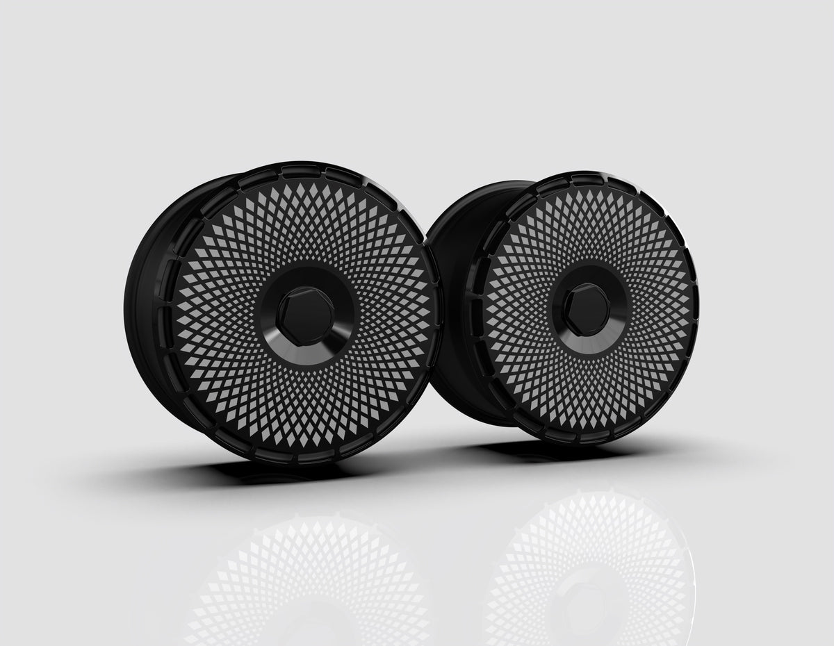Filigree aero wheel covers — studio render