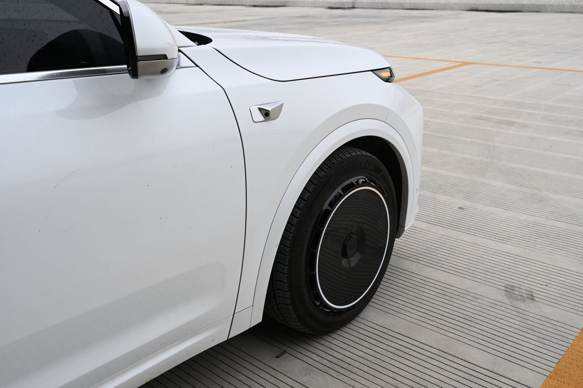 Pure Black wheel covers — real-world photo