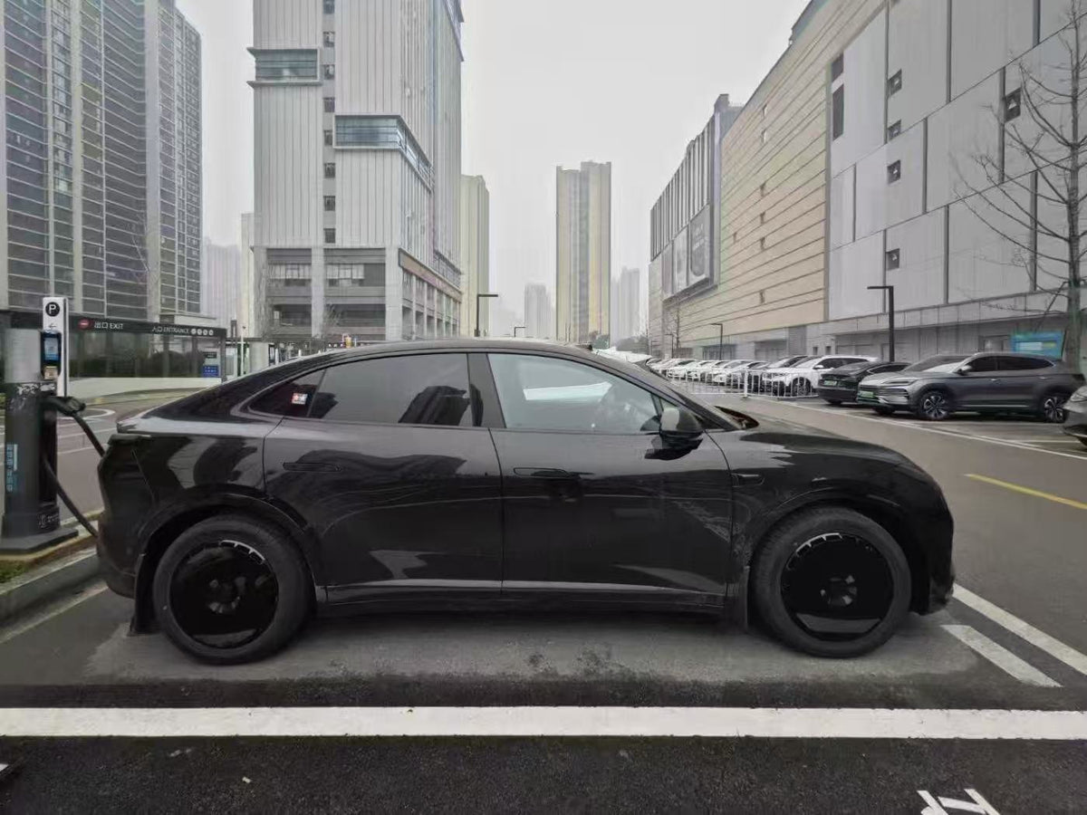 Pure Black wheel covers — real-world photo