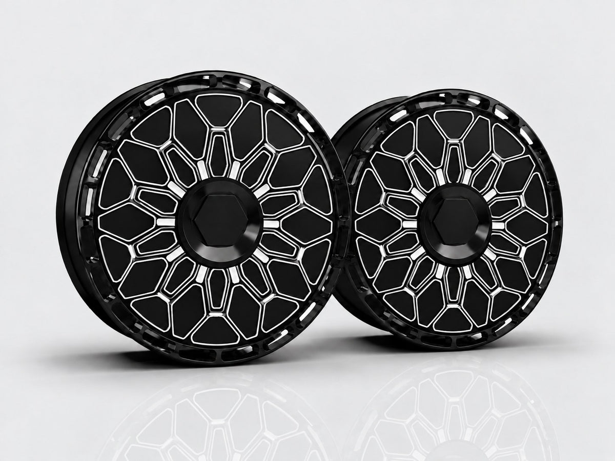 Black Geometric aero wheel covers — studio render